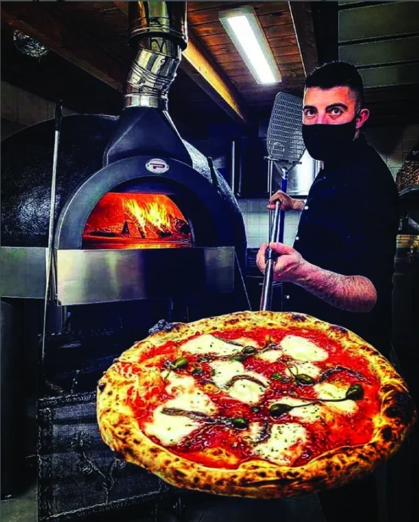Pizza chef with Joy 140 combination oven